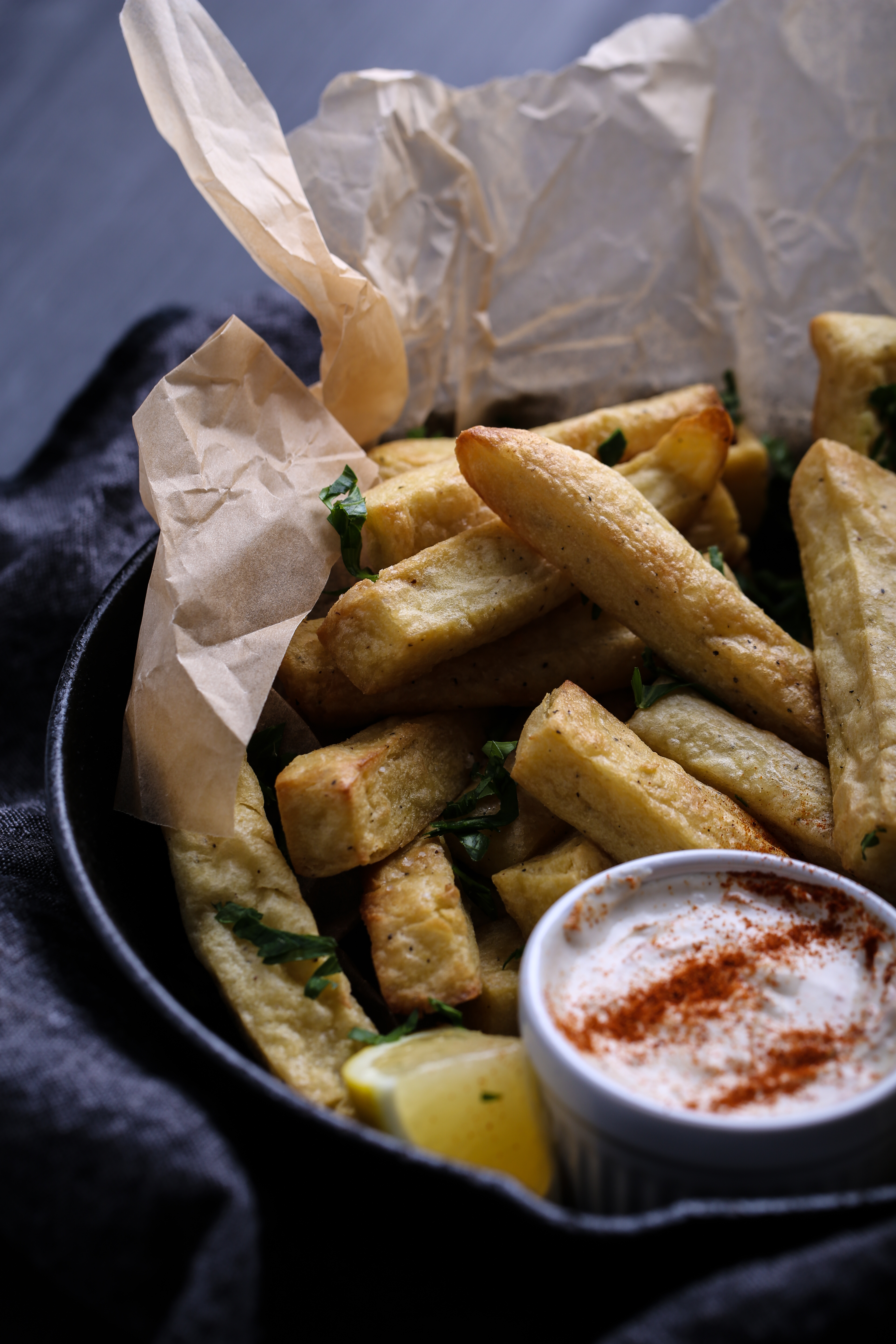 A plate of chickpea fries with yogurt-tahini sauce.