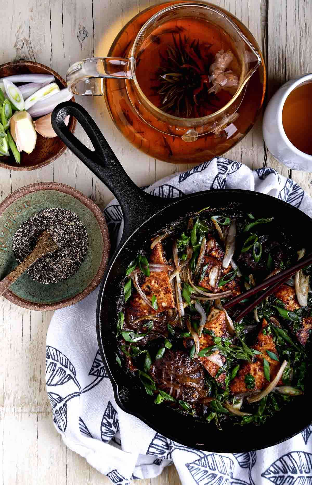 Chinese 5-spice tofu in a cast iron pan.