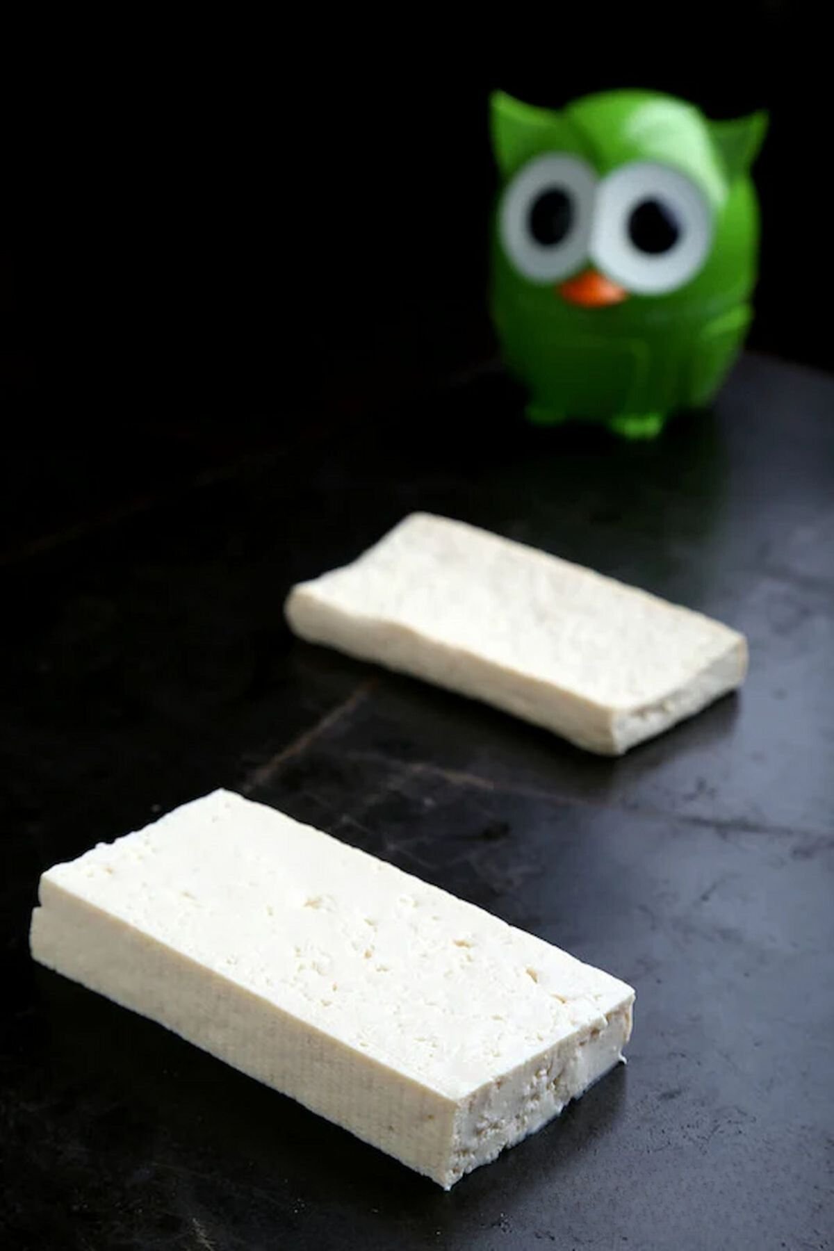 A side-by-side comparison of how to press tofu.