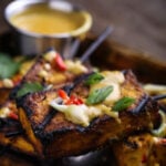 Tofu satay with peanut sauce.