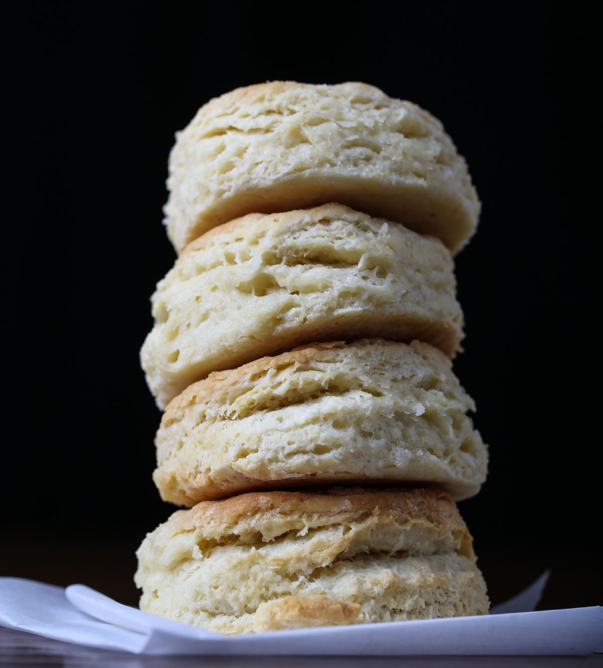 A stack of vegan biscuits on a tabletop.