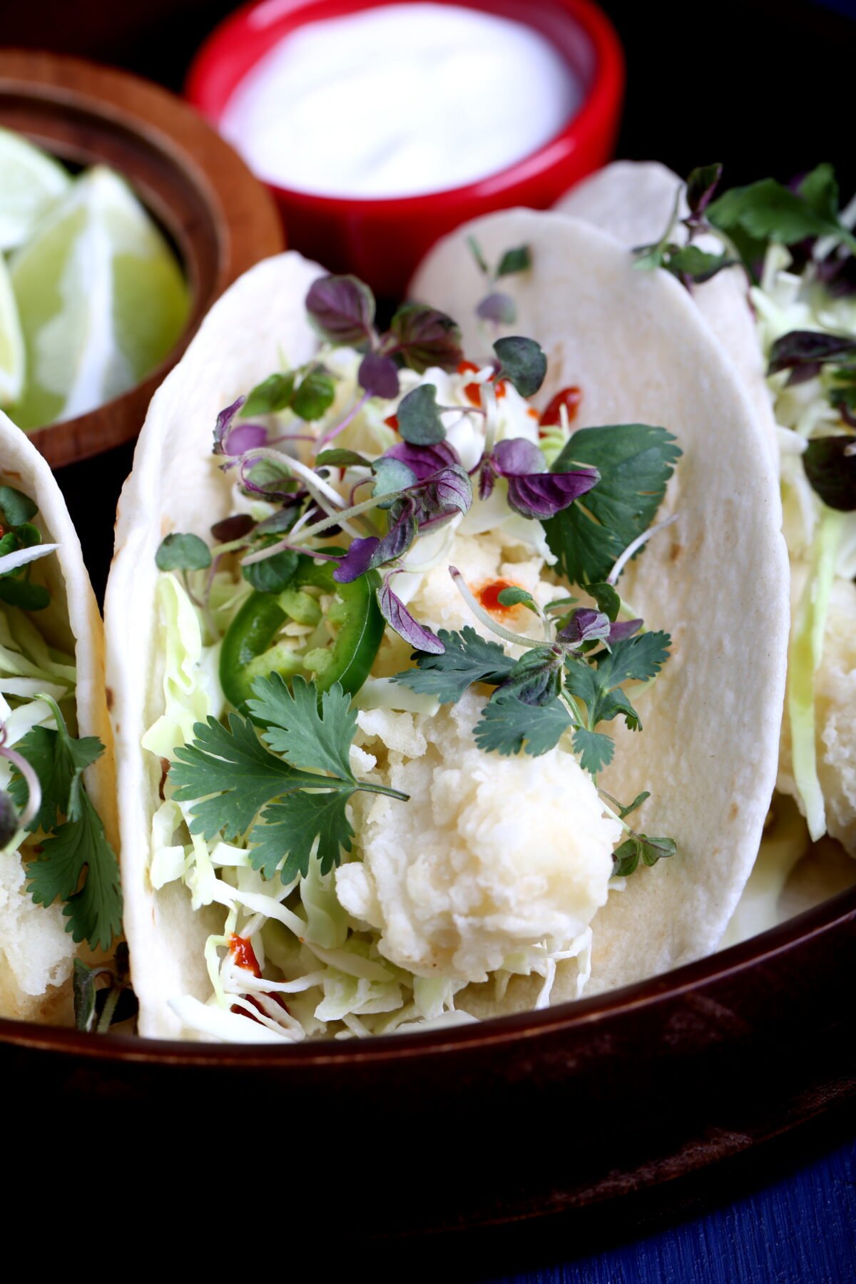 Vegan tacos made with breaded hearts of palm.