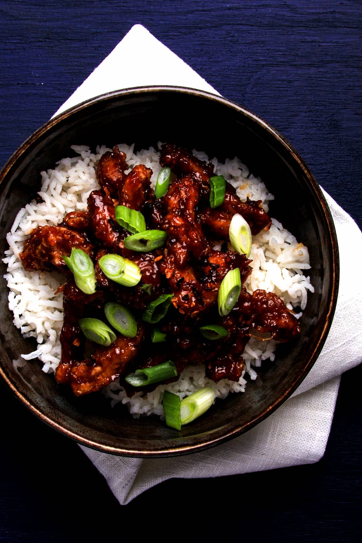 A bowl of vegan Mongolian beef made with soy curls.