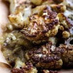 Vegan roasted cauliflower steaks with mushroom gravy.