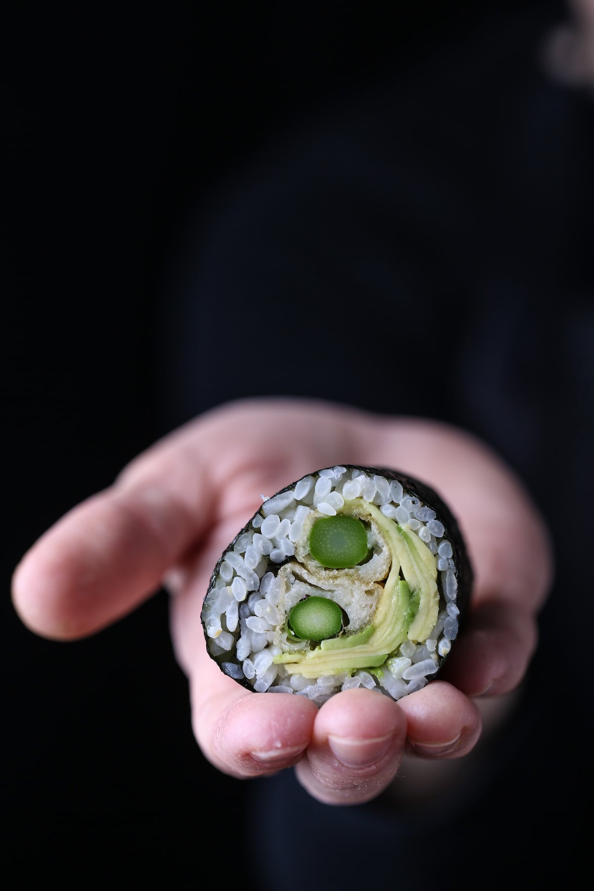 A piece of a vegan sushi maki roll.